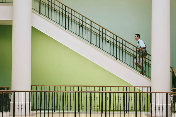 Student going up stairs in Miller hall